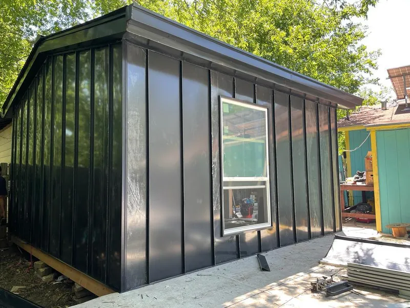 Black standing seam metal wall panels for Roof Inspection in Cedar Lake