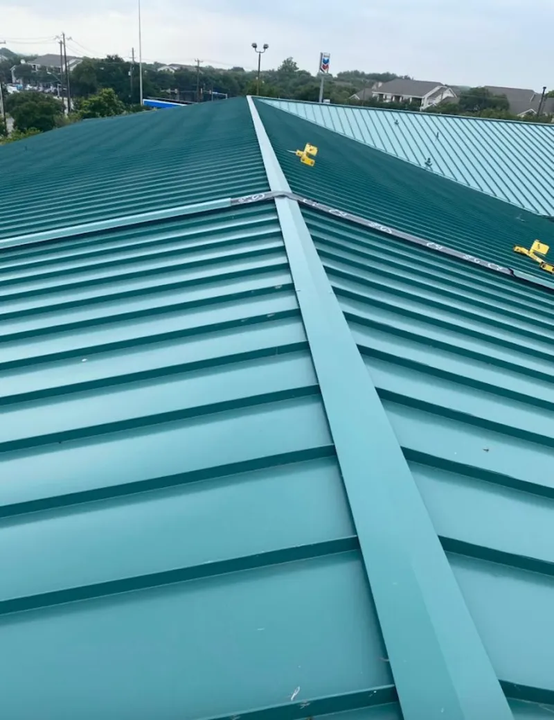 Green commercial metal roof ridge and valley for Metal Roof Repair in Cedar Lake